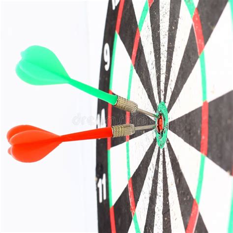 Dart Board with a Dart in the Center of the Target Stock Image - Image ...