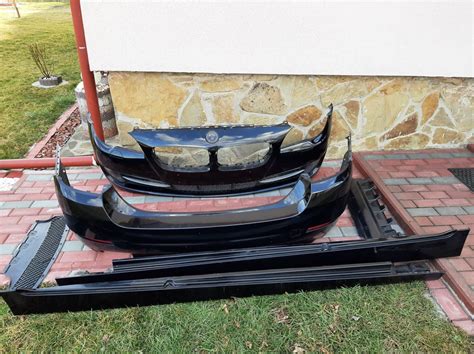 BMW F10 wersja standardowa body kit zderzak tył i progi, Tarnawka • OLX.pl