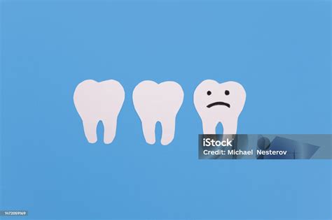 Dentition With Upset Paper Tooth Concept Of Dental Problems Caries Gum