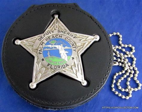 PALM BEACH COUNTY, FLORIDA DEPUTY SHERIFF BADGE IN FITTED LEATHER BELT CLIP