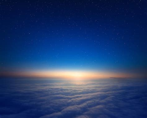 Premium Photo | Clouds and stars in the blue night sky