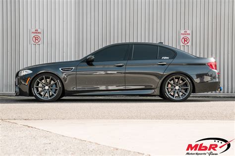 Carbon Fiber Lip and Vossen Rims on Black BMW M5 — CARiD.com Gallery