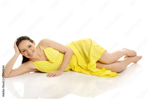 Beautiful Woman Lying In Yellow Dress Stock Foto Adobe Stock