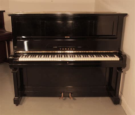 Yamaha U2 Upright Piano For Sale With A Black Case And Brass Fittings