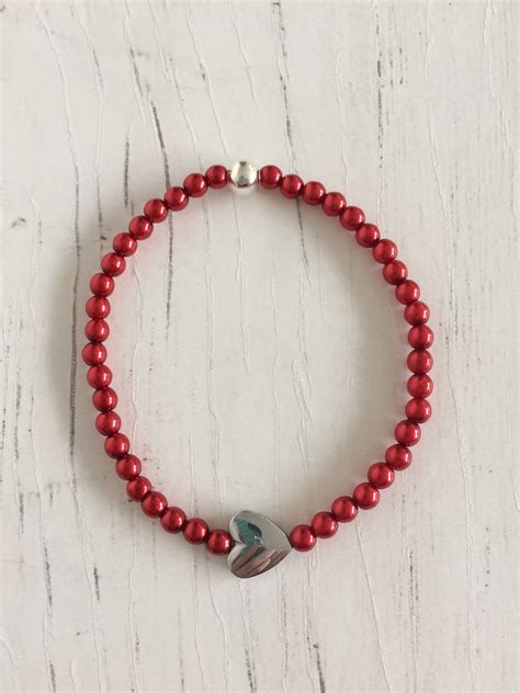 Red Bead Stretch Bracelet With Silver Plated Heart Bead Heart Beads