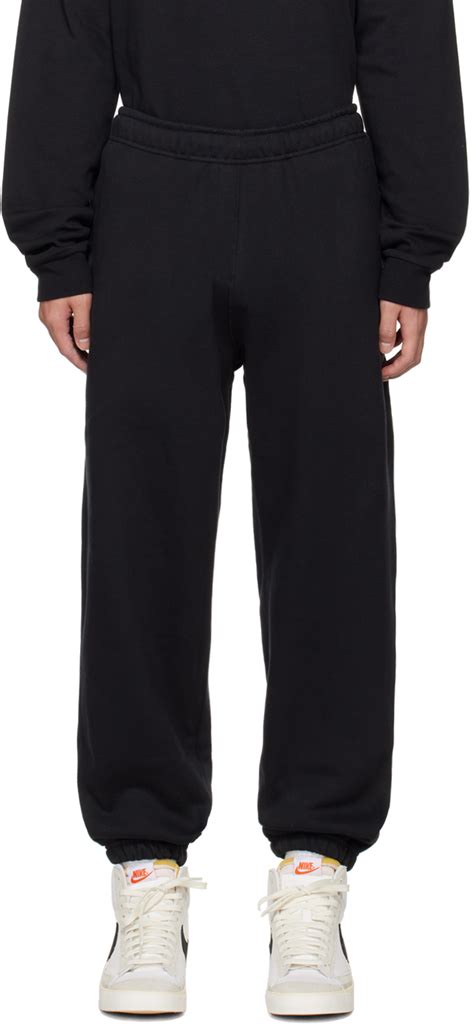 Black Solo Swoosh Lounge Pants By Nike On Sale