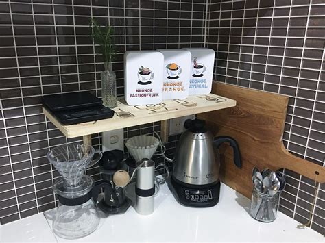 My little brew corner. I engraved the shelf with a bunch of neat coffee
