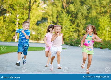 Preschoolers running stock photo. Image of competitive - 16369124