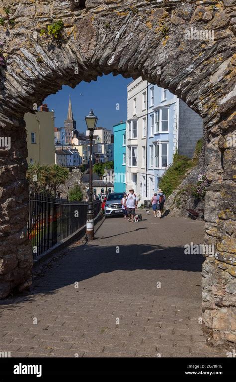 Tenby Castle gateway on Castle Hill leading to Tenby town, Pembrokeshire, Wales Stock Photo - Alamy