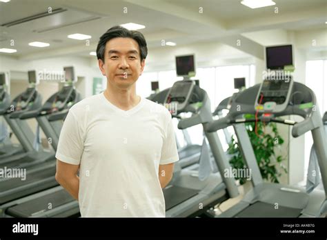 Mature Man Standing In The Gym Stock Photo Alamy