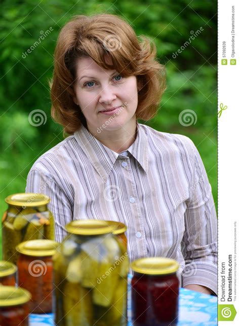 Housewife With Homemade Pickles And Jams In Garden Stock Image Image