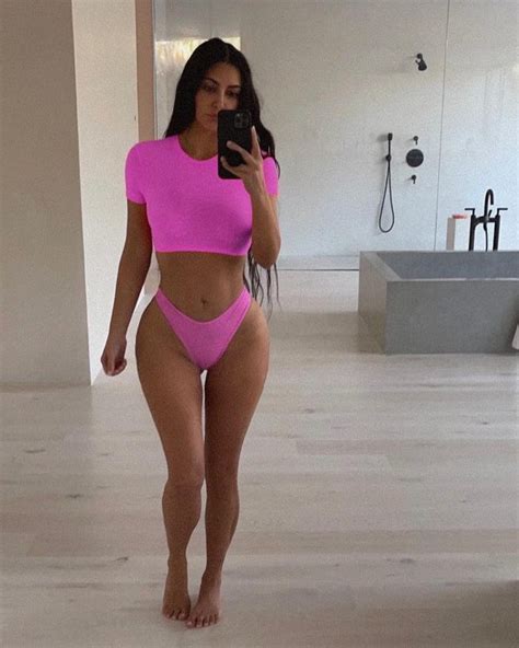 Kim Kardashian S Seductive Curves In Pink Bikini Photos The
