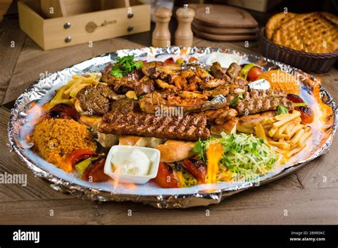 Full View Of Persian Mix Kebab Of Minced Meat And Chicken With Rice And