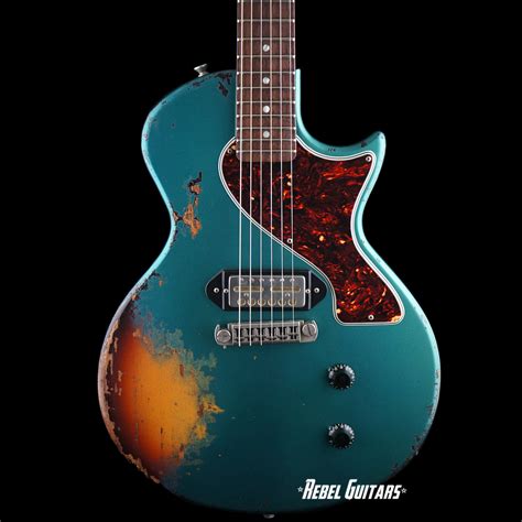 Rock N’ Roll Relics Thunders Sc In Ocean Turquoise Over Sunburst Rebel Guitars