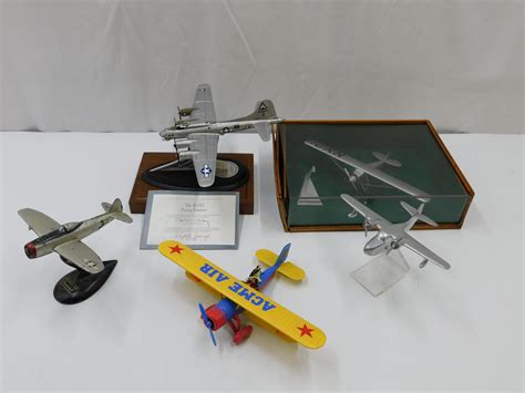 Bid Now: Lot of Diecast and Wooden Model Airplanes - May 3, 0123 11:00 AM EDT