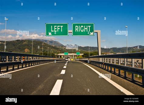 Road With Left And Right Road Signs Stock Photo Alamy