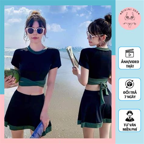 Bikini đồ bơi nữ đi biển áo croptop đen viền xanh rêu ôm body tay ngắn váy xòe quần cạp cao