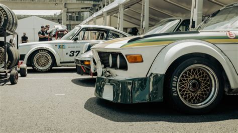 Racecars Lined Up at a Parking Lot · Free Stock Photo