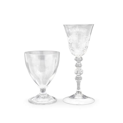 Bonhams A Dutch Engraved Royal Armorial Light Baluster Wine Glass Circa 1760