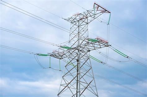 Premium Photo Tower Of A Highvoltage Power Line Against The Of Blue