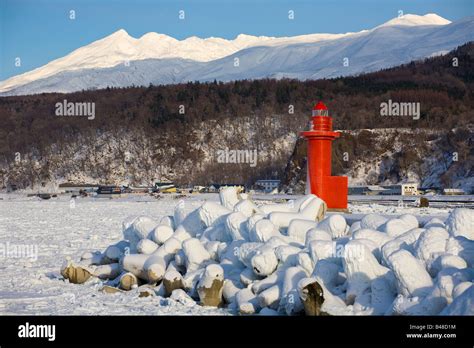 Hokkaido Island Japan Red port lighthouse at the Utoro fishing village ...