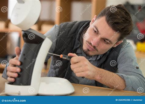 Serious Man Repairing Broken Coffee Machine Stock Photo Image Of Work