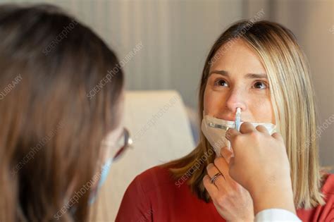 Nasal spray flu vaccine - Stock Image - C057/0283 - Science Photo Library