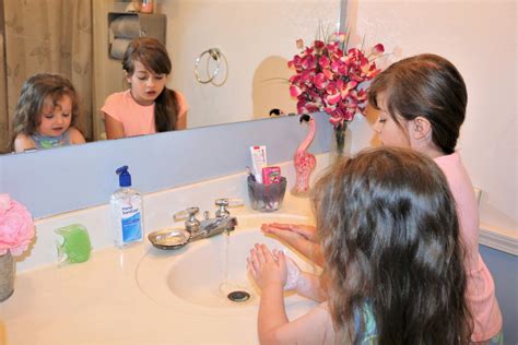 girls washing hands  stock photo public domain pictures