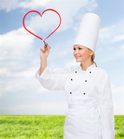 Smiling Female Chef Drawing Red Heart On Air Stock Image Image Of