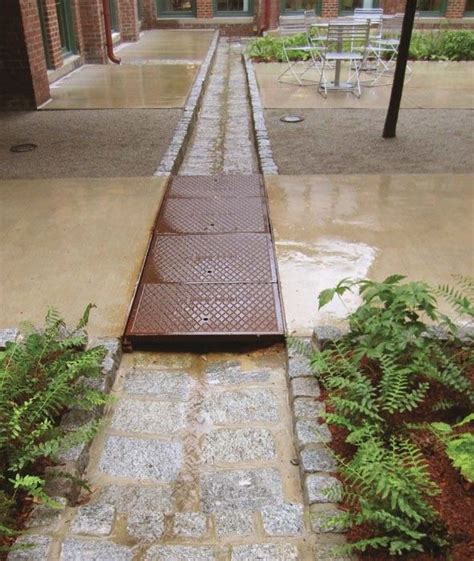 Cobblestone Runnels Direct Water Away From Buildings And Into The Rain