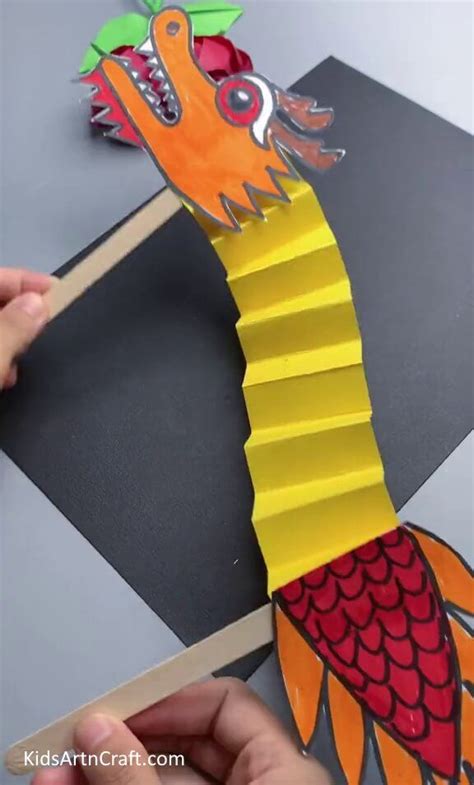 Easy Chinese Paper Dragon Craft Tutorial | Dragon crafts, Paper dragon ...