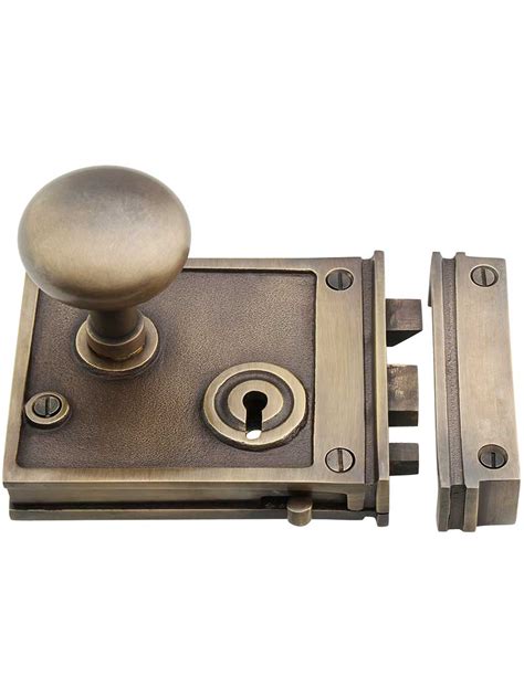 Solid Brass Horizontal Rim Lock Set With Small Round Knobs In Antique