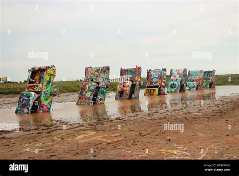 Cadillac Ranch, Route 66, rain-soaked graffiti Stock Photo - Alamy