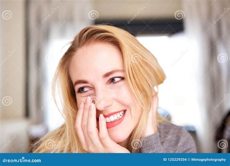 Close Up Young Blond Woman Laughing At Home Stock Photo Image Of