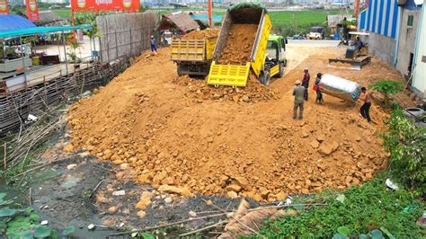 Update Project Showing Landfilling Dump Truck Unloading Soil Bulldozer