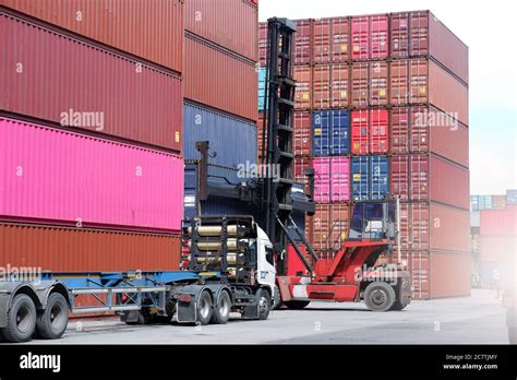 Container handling equipment in the port Stock Photo - Alamy