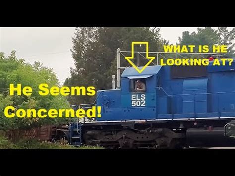 The Crew Seemed Concerned As This Train Crawls By This Railroad