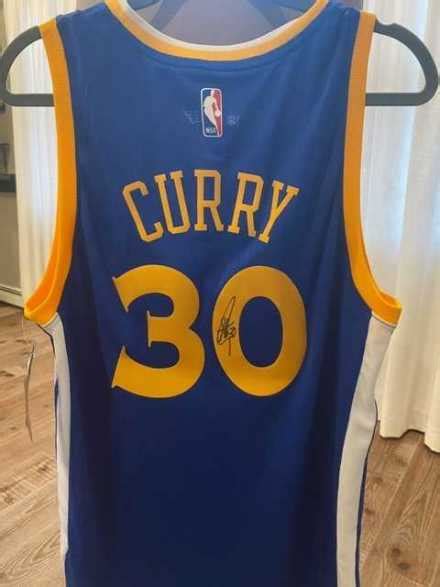 Signed Steph Curry Jersey | AirAuctioneer