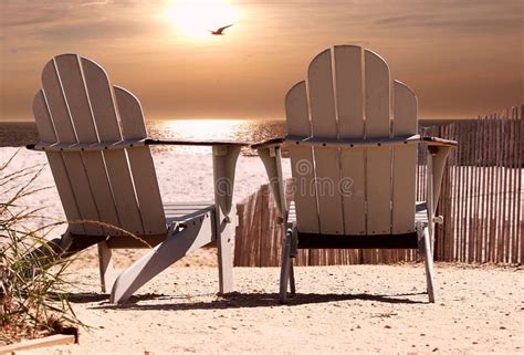 Beach Chairs With Stunning Sunset