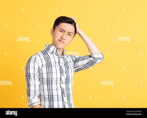 Confused Asian Young Man Thinking Stock Photo Alamy