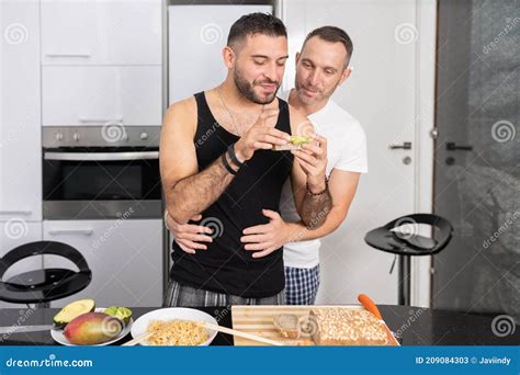 Gay Couple Cooking Healthy Vegan Food Together At Home Stock Image Image Of Nuts Kitchen