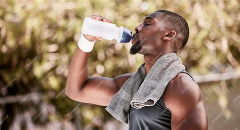 Person Drinking Water Bottle