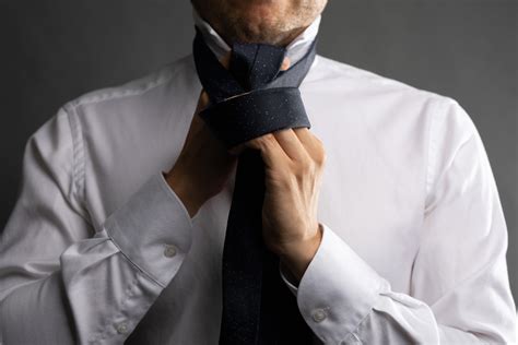 How to Tie a Four In Hand Knot (Step-By-Step Guide) - The Modest Man