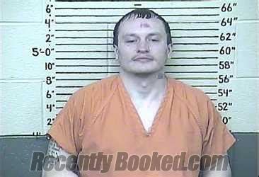 Recent Booking Mugshot For Corey Benton In Carter County Kentucky