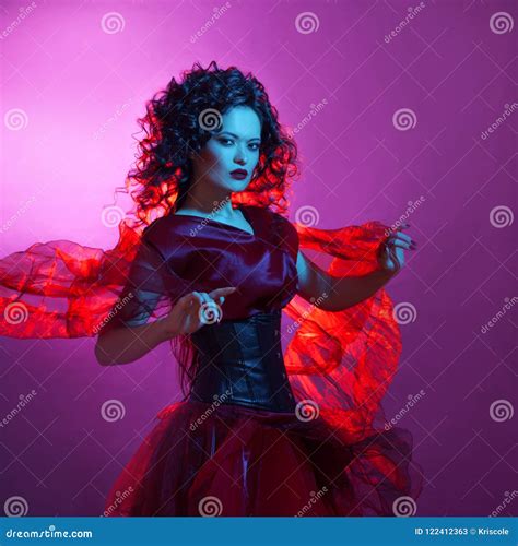 Gothic Girl In Red Dancing Woman With Flying Red Dress Stock Image