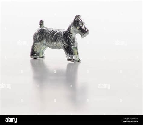 Monopoly board game pieces Stock Photo - Alamy