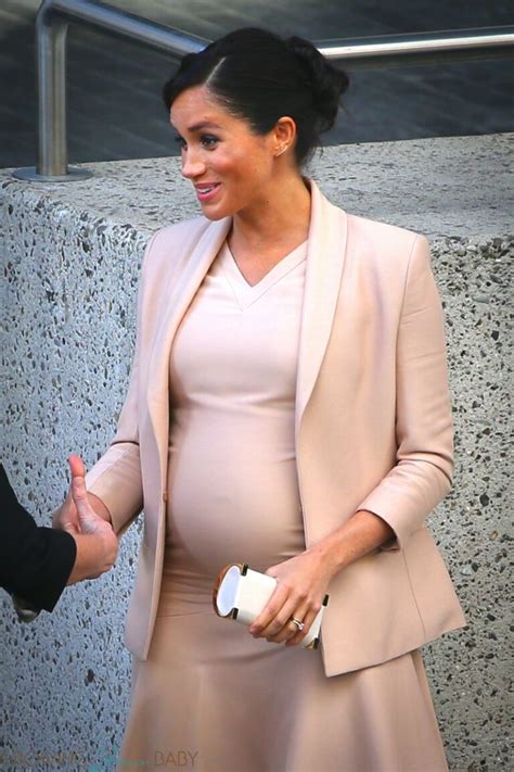 Pregnant Meghan Markle Shows Off Her Baby Bump At The National Theatre