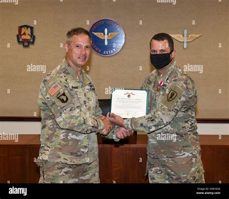 Us Army Chief Warrant Officer 4 Bryan K Potter Receives The