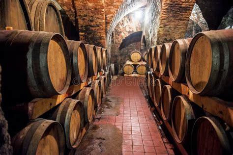 Wine In Wooden Barrels Is Stored Wine Cellar Stock Image Image Of