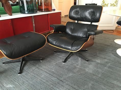 Fauteuil lounge chair et son ottoman Charles Eames édition Herman